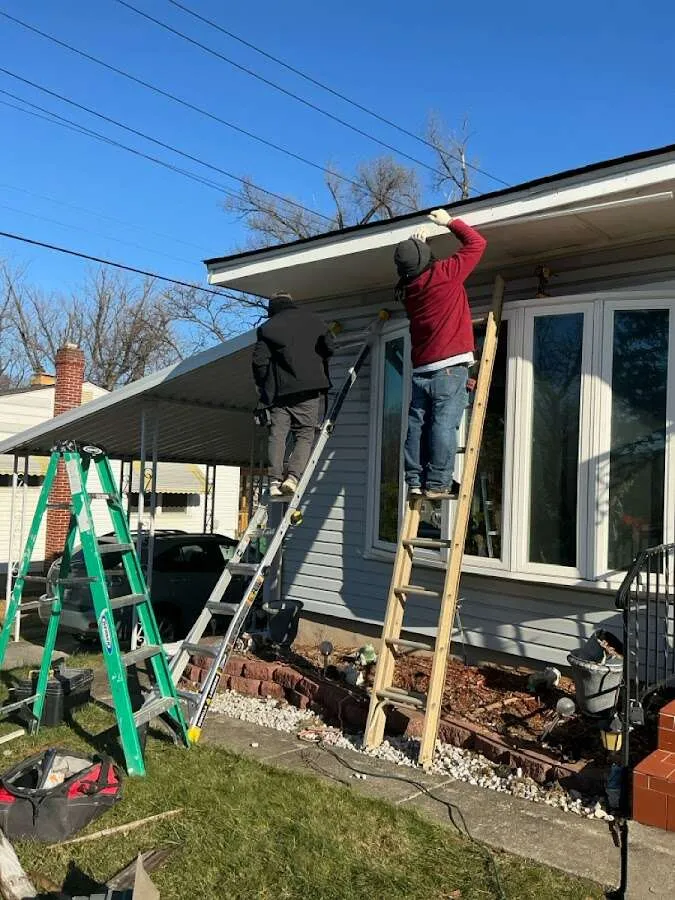 Restoration crew performing exterior repair in Gorham
